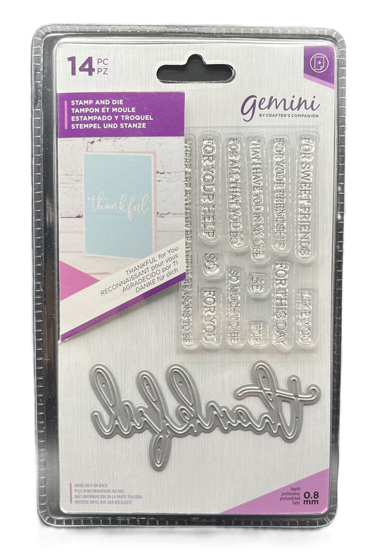 Packaged Gemini stamp and die set with 'happiness' text on a white background