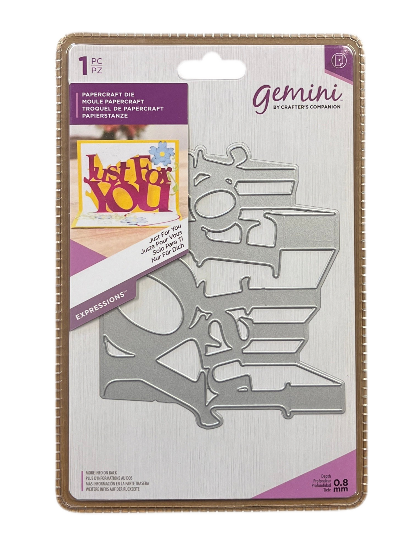 Packaged Gemini die set with decorative text on a white background