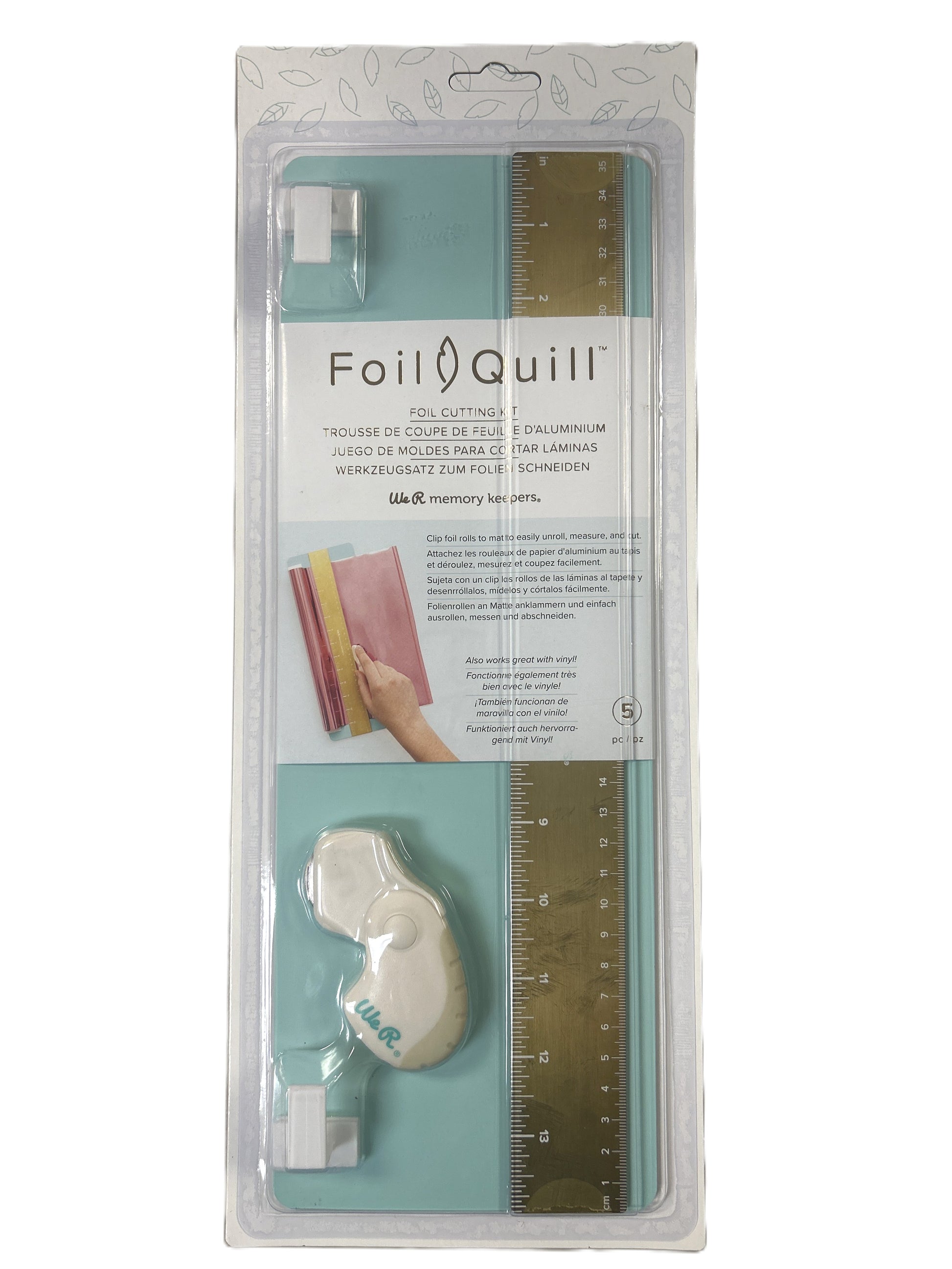 Foil Quill product packaging with a ruler and cutting tool on a white background