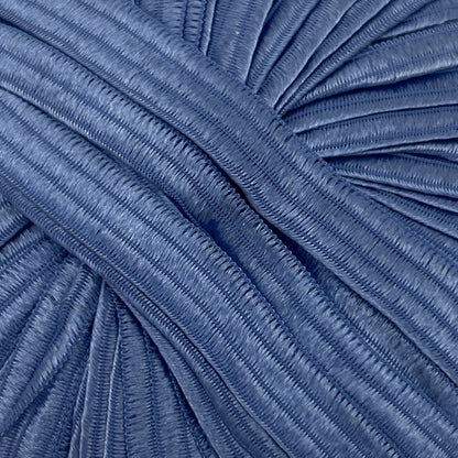 Close-up of pleated blue fabric texture