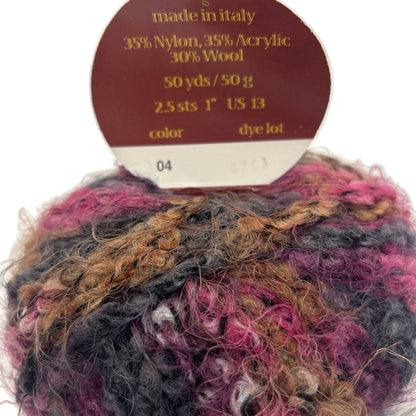 Multicolored yarn ball with a label indicating fiber content and measurements.
