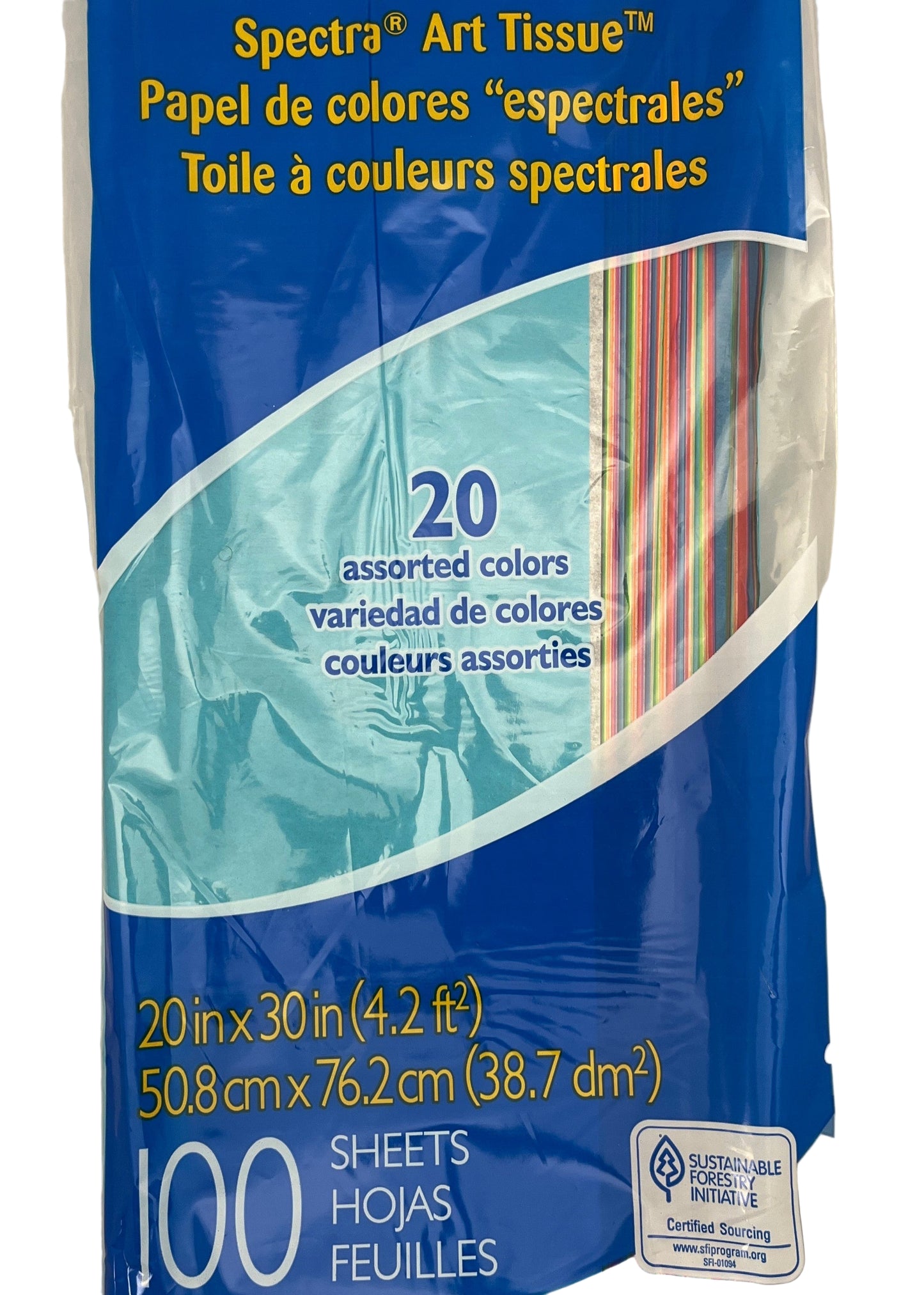 Package of Spectra Art Tissue with colorful stripes on a blue background