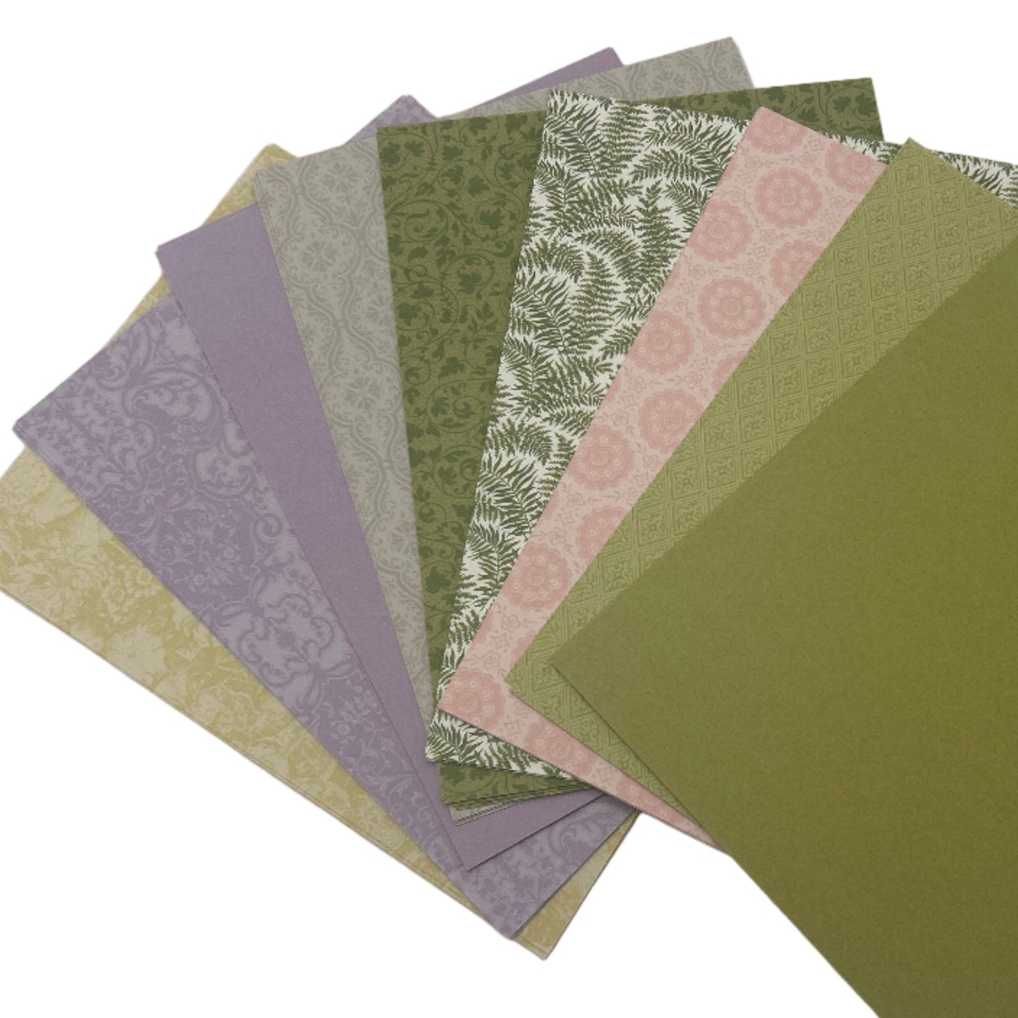 Set of green and purple patterned papers on a white background