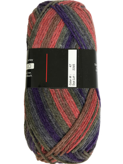 Multicolored skein of yarn with a label on a white background