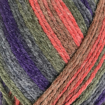 Multicolored skein of yarn with label on a white background