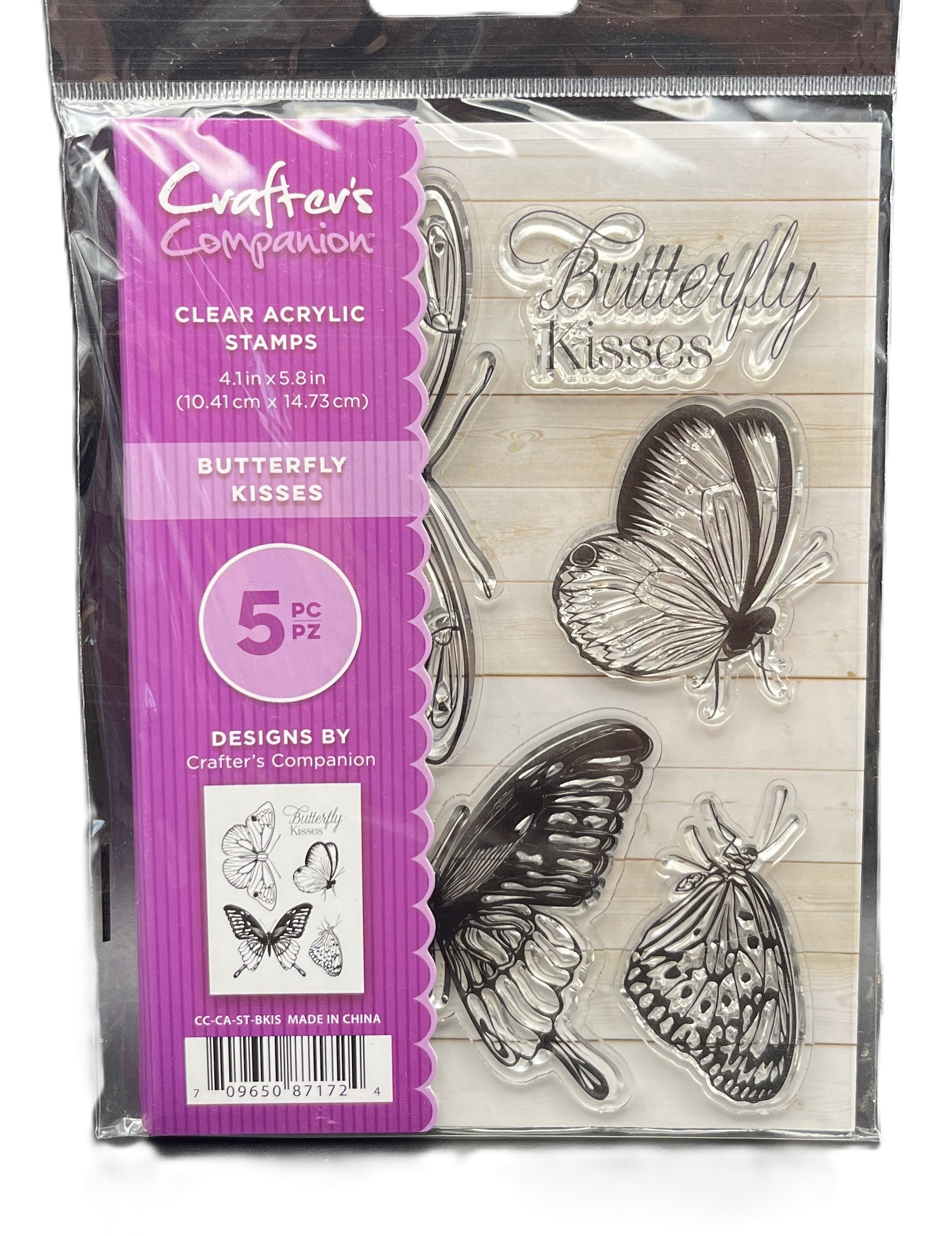 Packaged clear acrylic stamps with butterfly designs by Crafter's Companion on a white background.