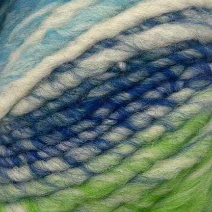 Close-up of multicolored yarn with blue, green, and white tones.