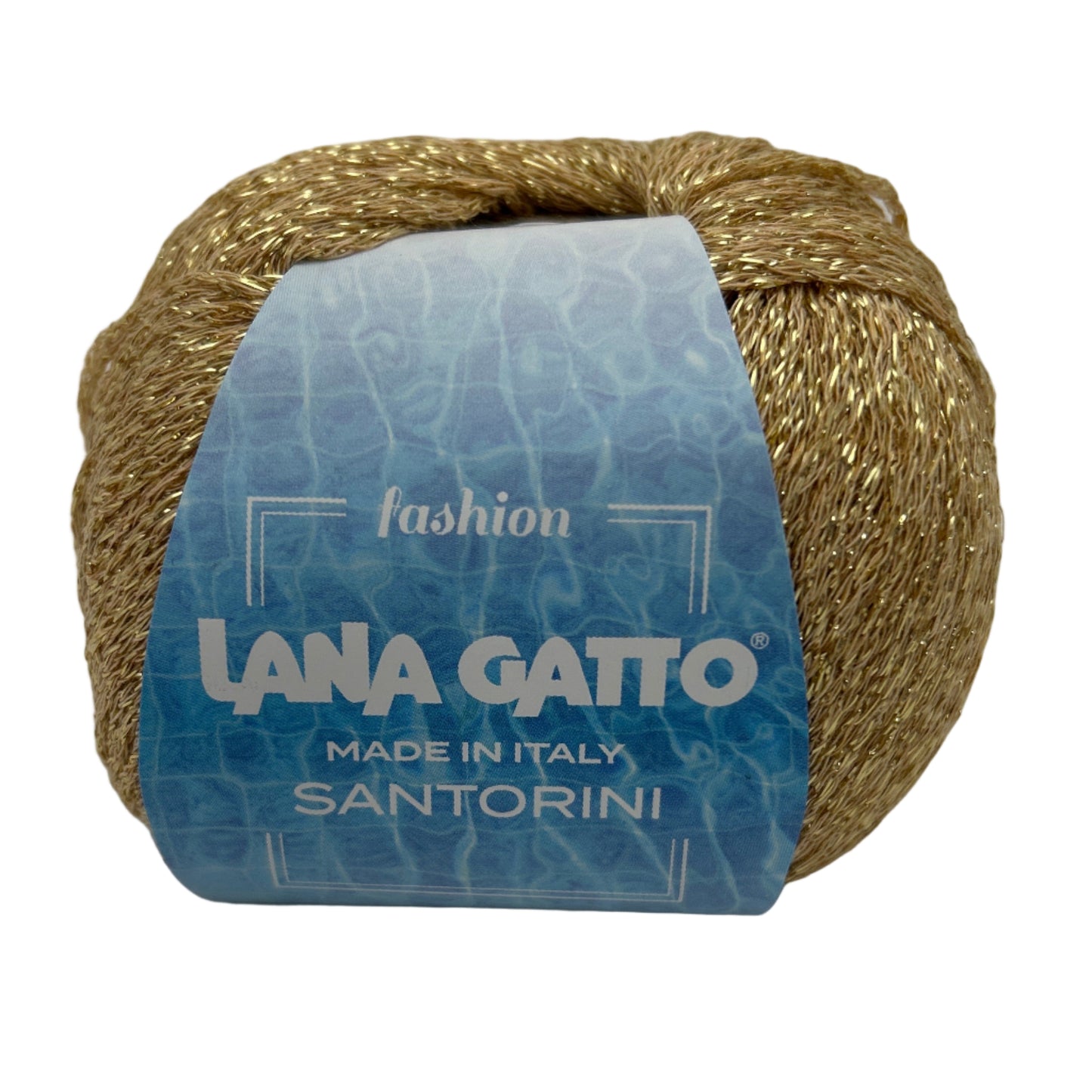 Ball of gold yarn with a blue label on a white background