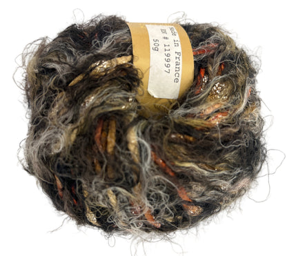 Ball of multicolored yarn with a label on a white background