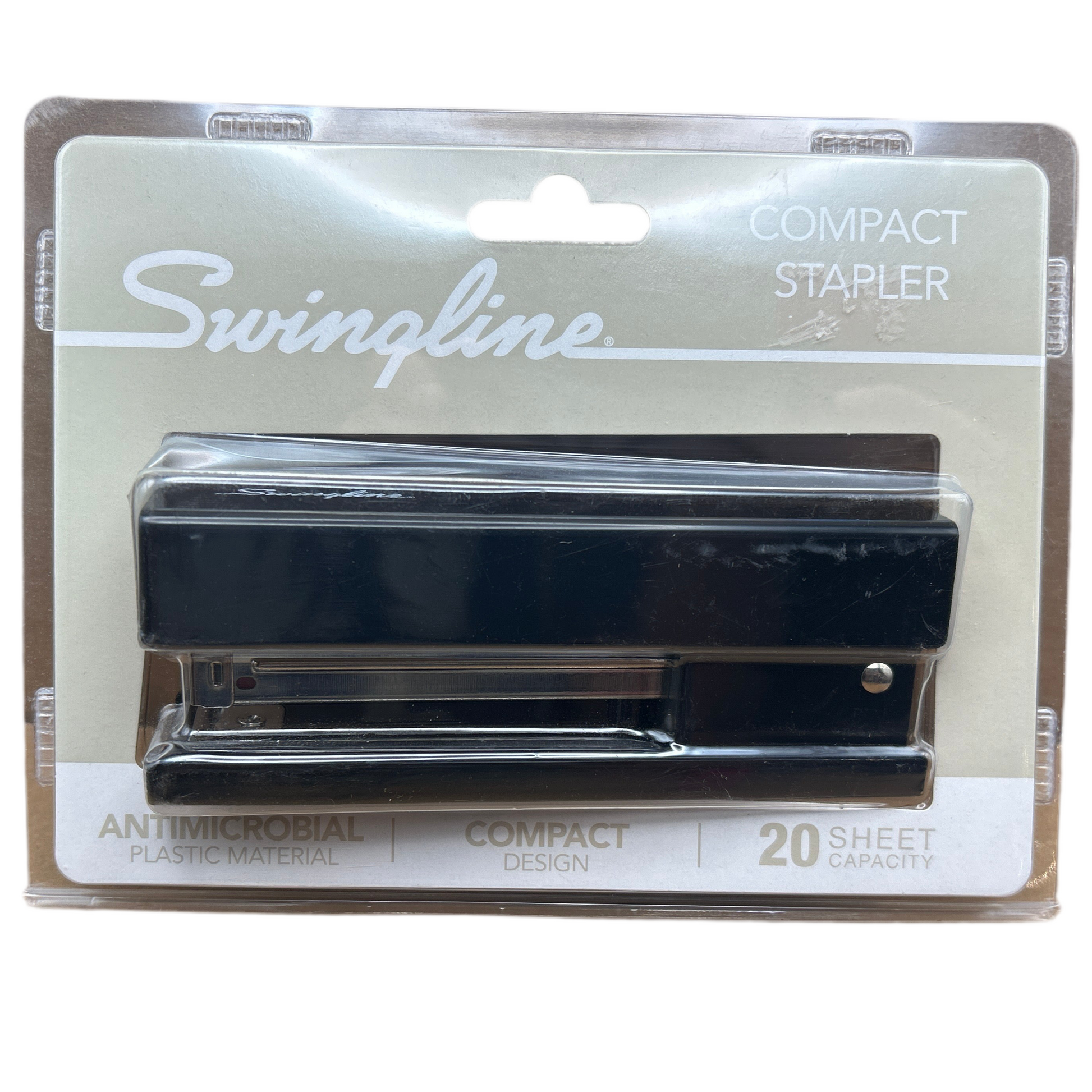 Swingline compact stapler in packaging on a white background