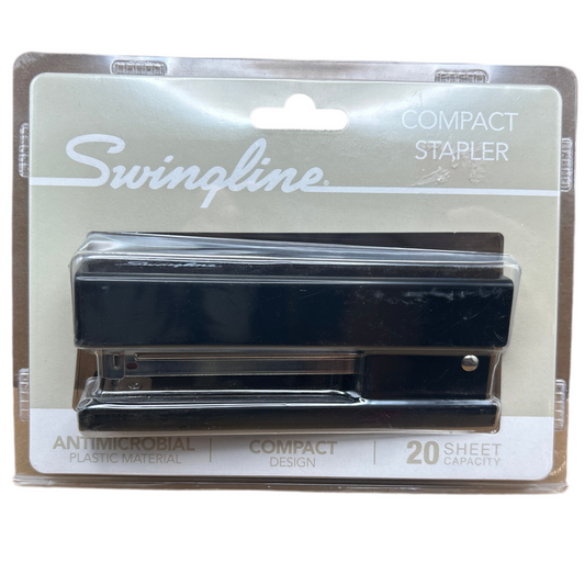 Swingline compact stapler in packaging on a white background