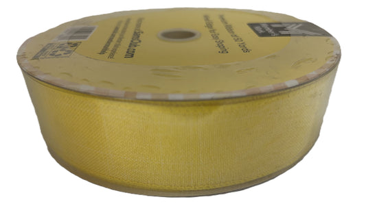 Yellow roll of fabric with a white background