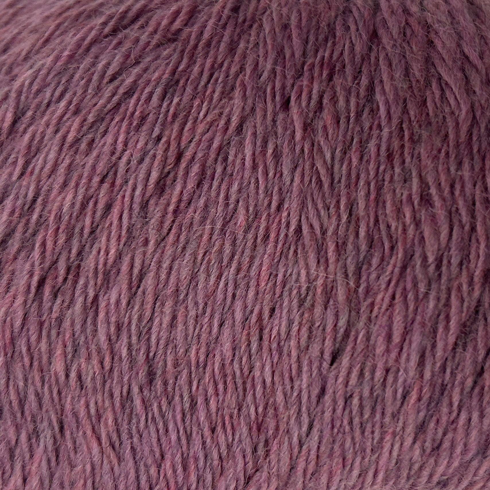 Close-up of a ball of purple yarn