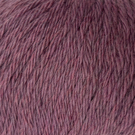 Close-up of a ball of purple yarn