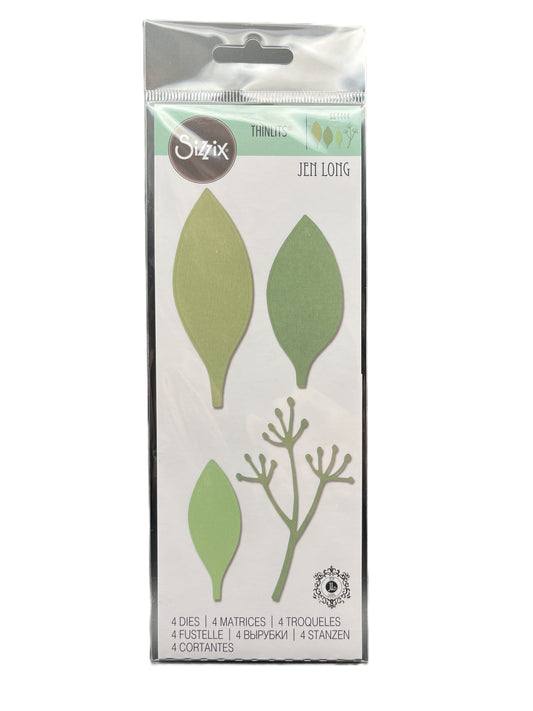 Packaging of green leaf-shaped dies with a brand logo on a white background