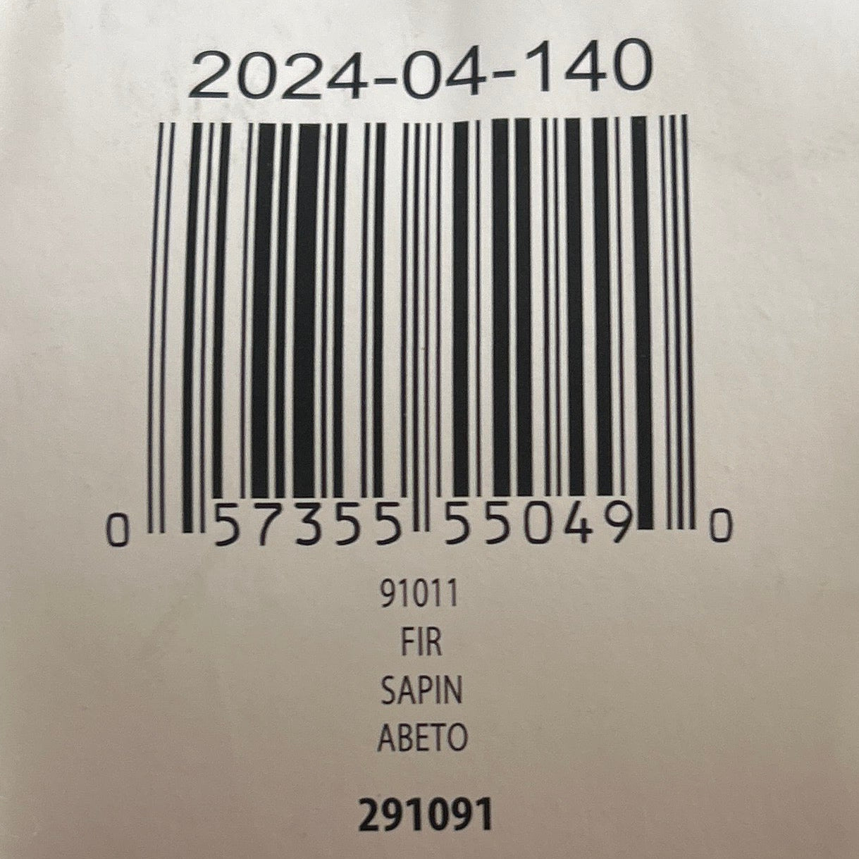 Ball of yarn with a label on a wooden surface