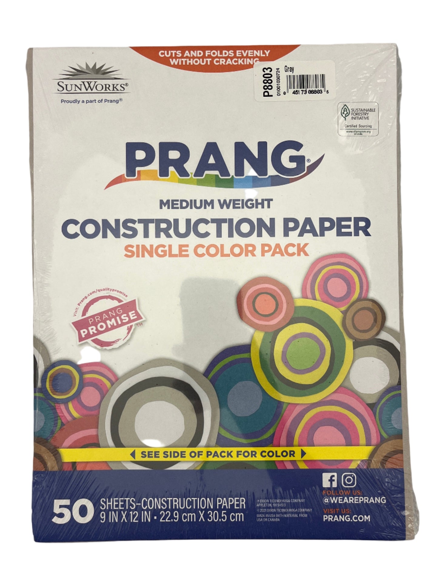 Prang construction paper pack with colorful design on a gray background