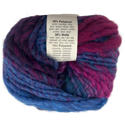 Multicolored yarn ball with a label on a white background