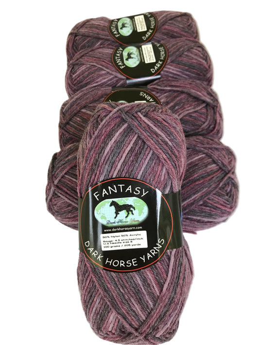 Three skeins of purple yarn with 'Dark Horse Yarns' labels on a light background