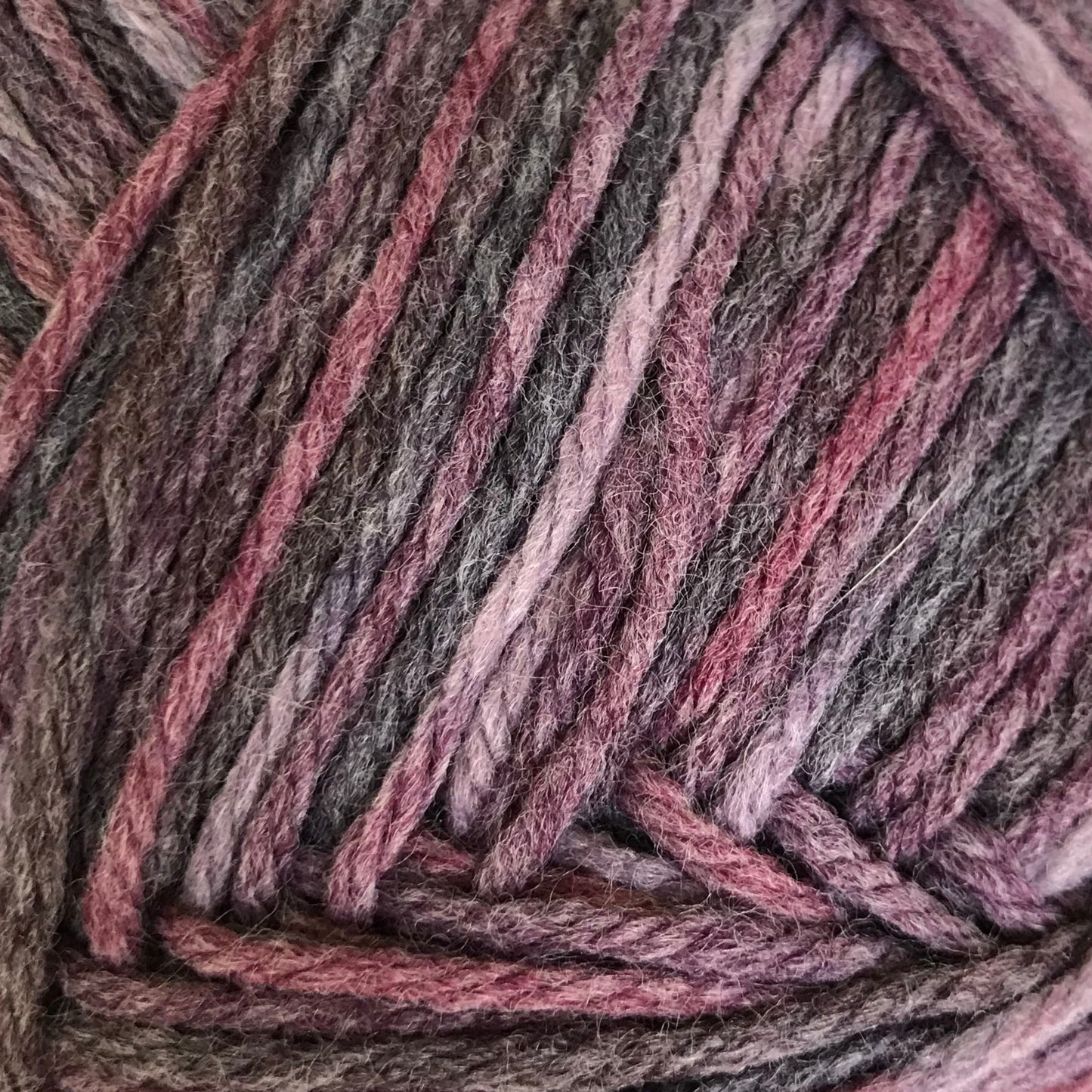 Multicolored yarn ball on a white background