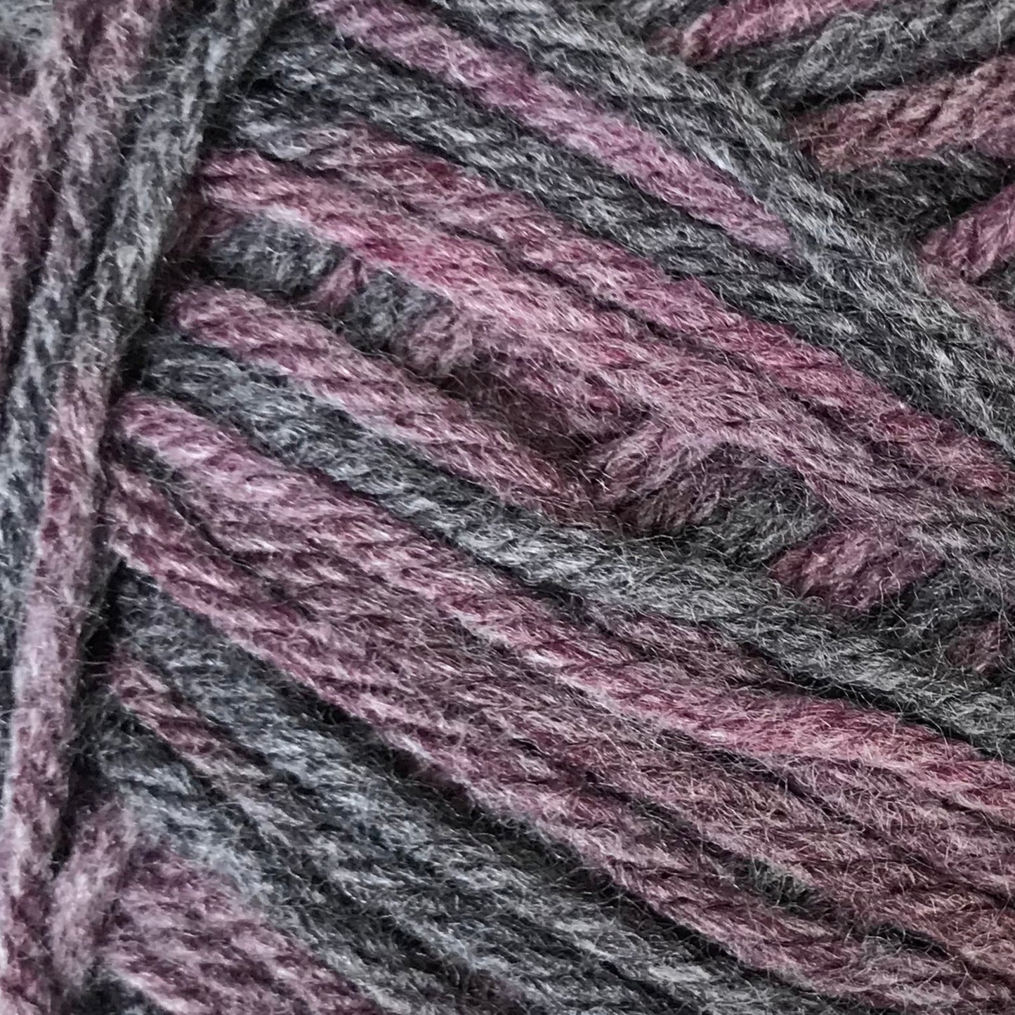 Ball of yarn with a label on a white background
