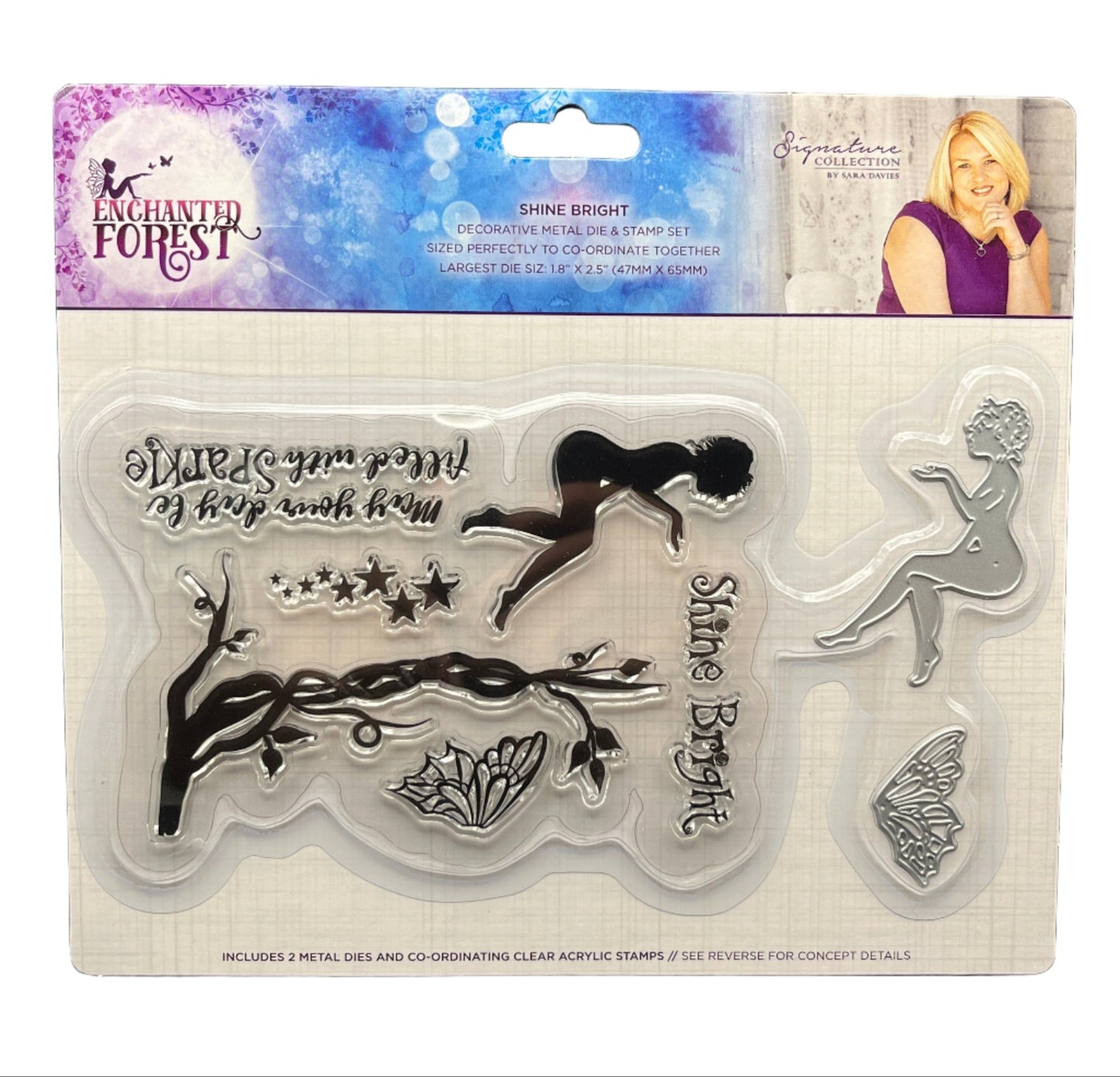 Packaged set of metal dies and clear acrylic stamps with fairy design on a white background