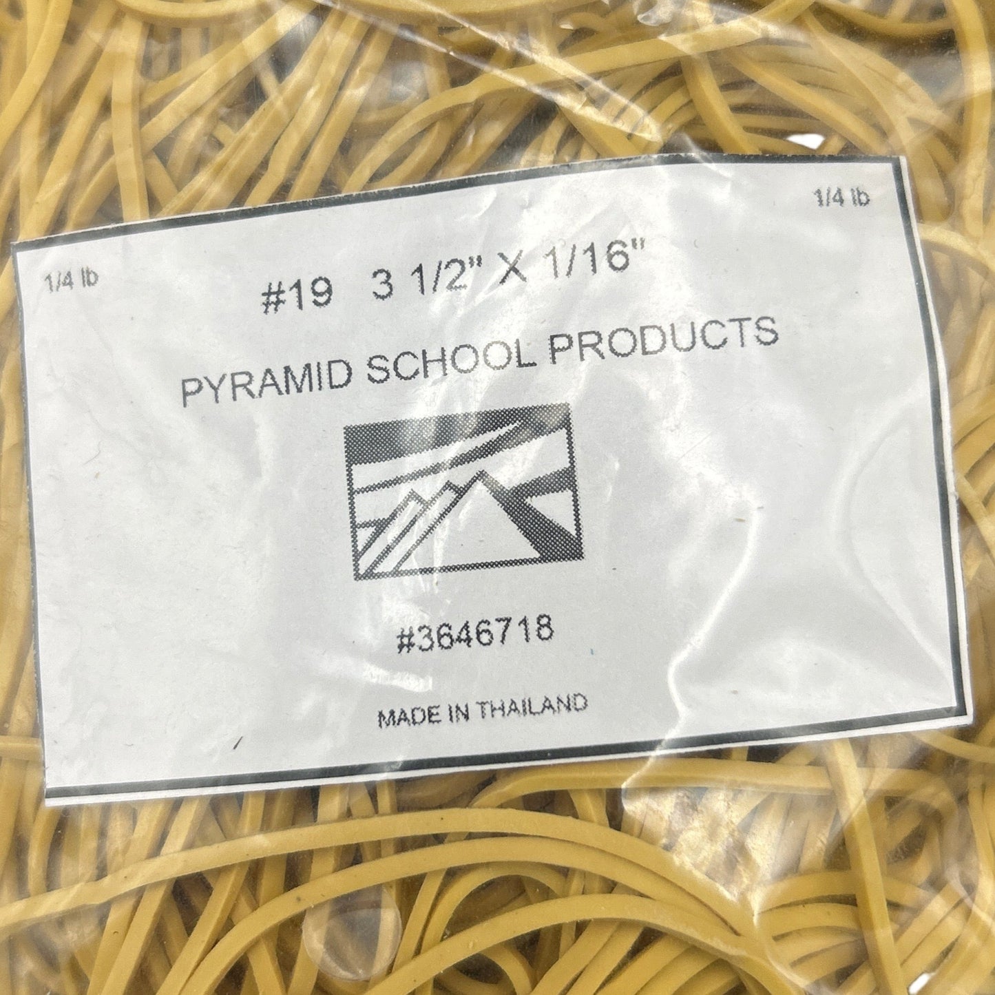 Packaged yellow rubber bands with Pyramid School Products label on a white background