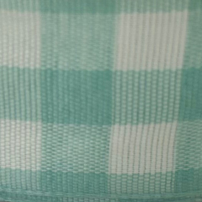 Close-up of green and white checkered fabric pattern