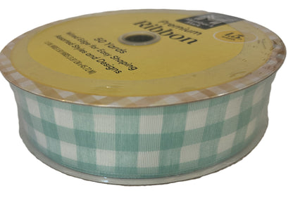 Spool of green and white checkered ribbon with a yellow label.