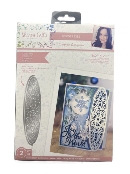 Packaged metal die set with decorative border design and 'Joy to the World' text.