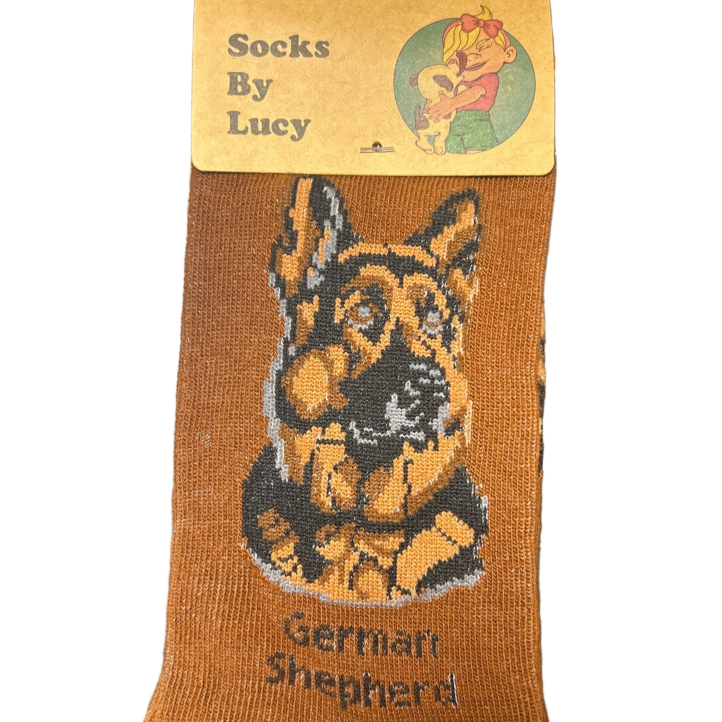 Brown sock with German Shepherd design on a dark surface, featuring a label.
