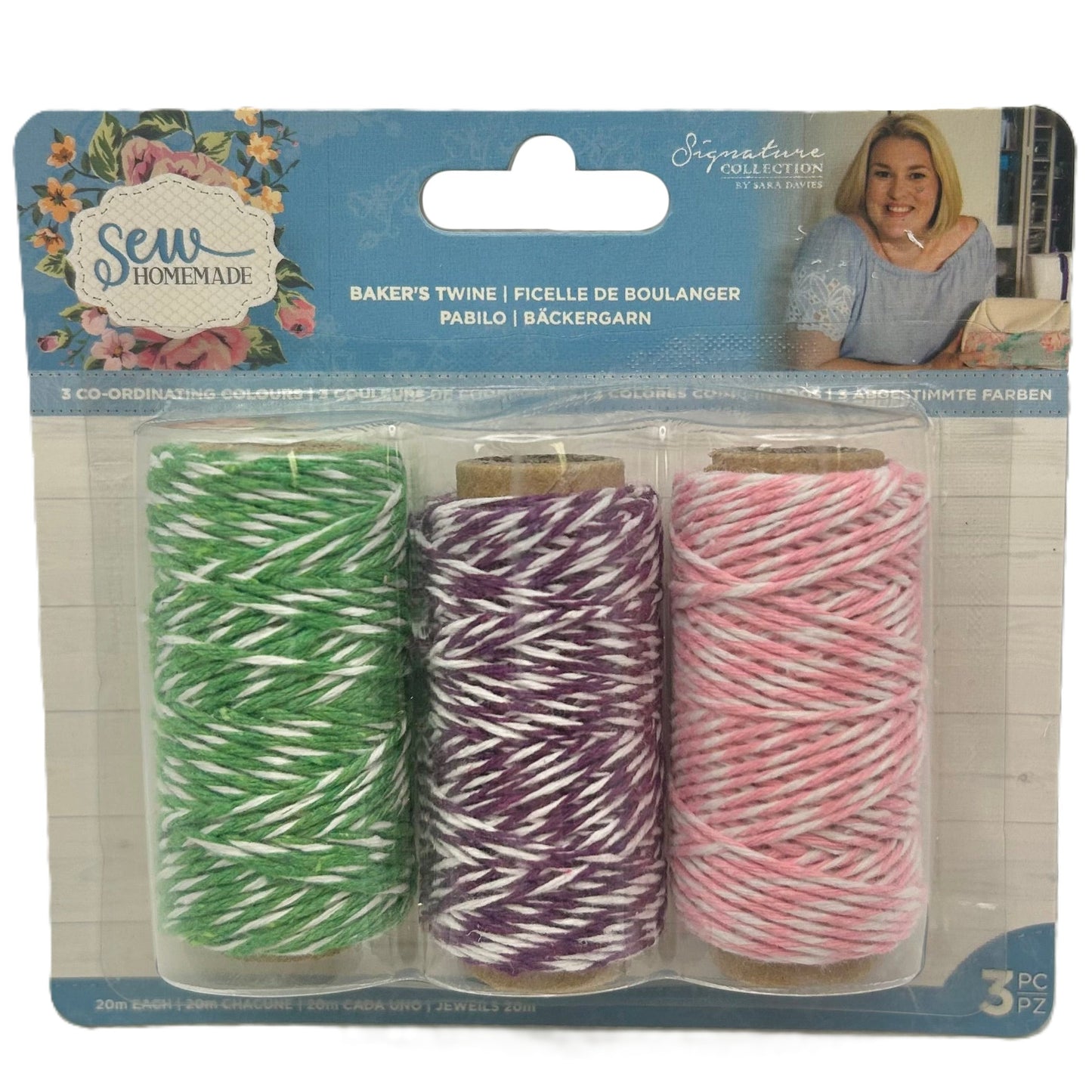Packaged set of three spools of baker's twine with colorful patterns on a white background.