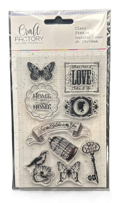 Clear stamps with various designs including butterflies, birds, and text on a Craft Factory packaging.