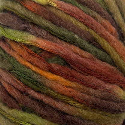 Multicolored skein of yarn on a white background