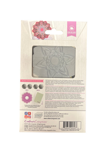 Packaged metal die with floral design on a white background