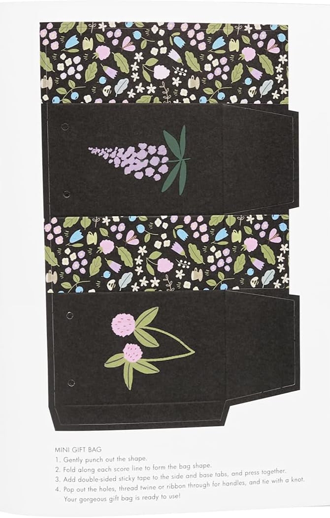 Floral patterned gift bag with black accents on a white background