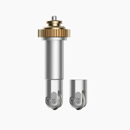 Metal valve stem with gold top and silver body on a white background