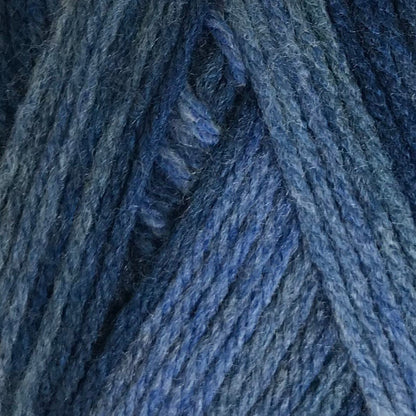 Blue skein of yarn with a label on a white background