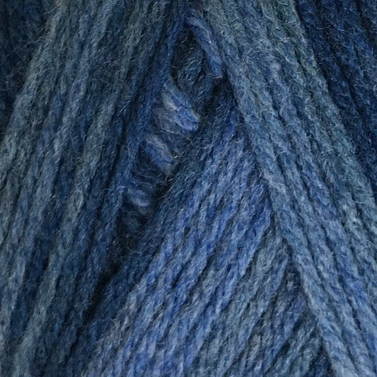 Blue skein of yarn with a label on a white background