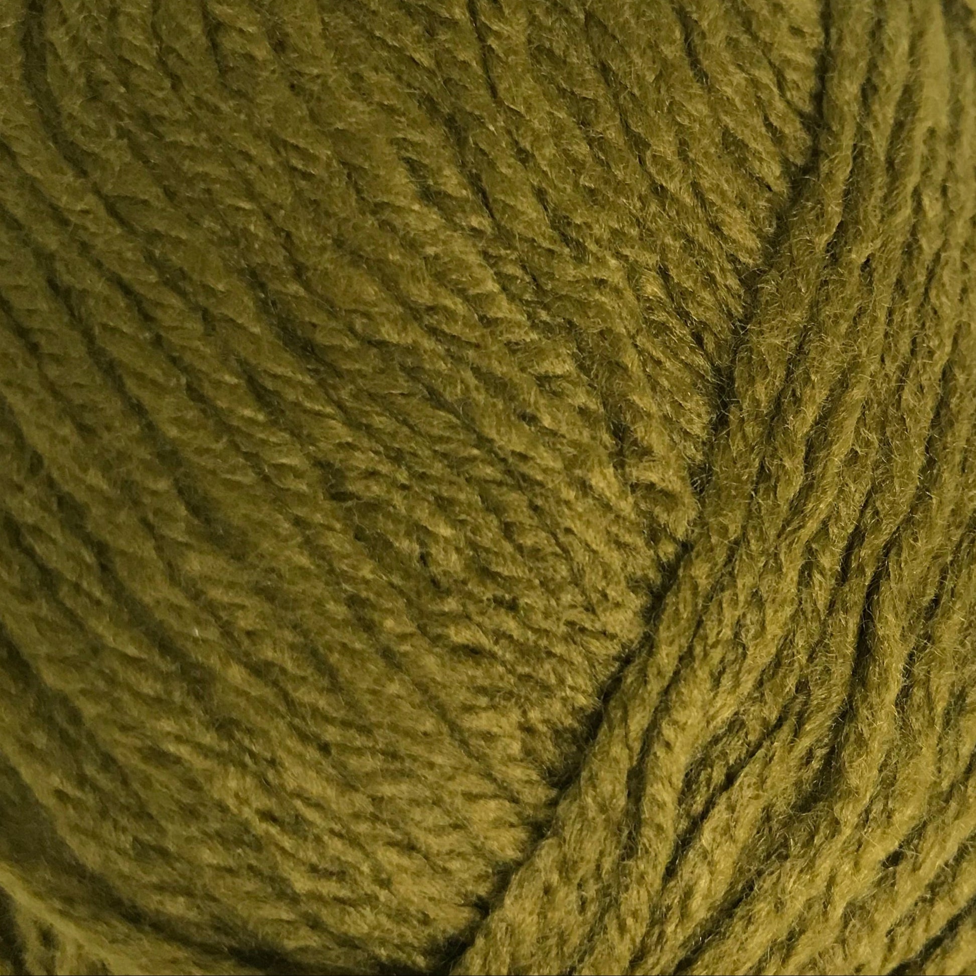Close-up of a ball of green yarn