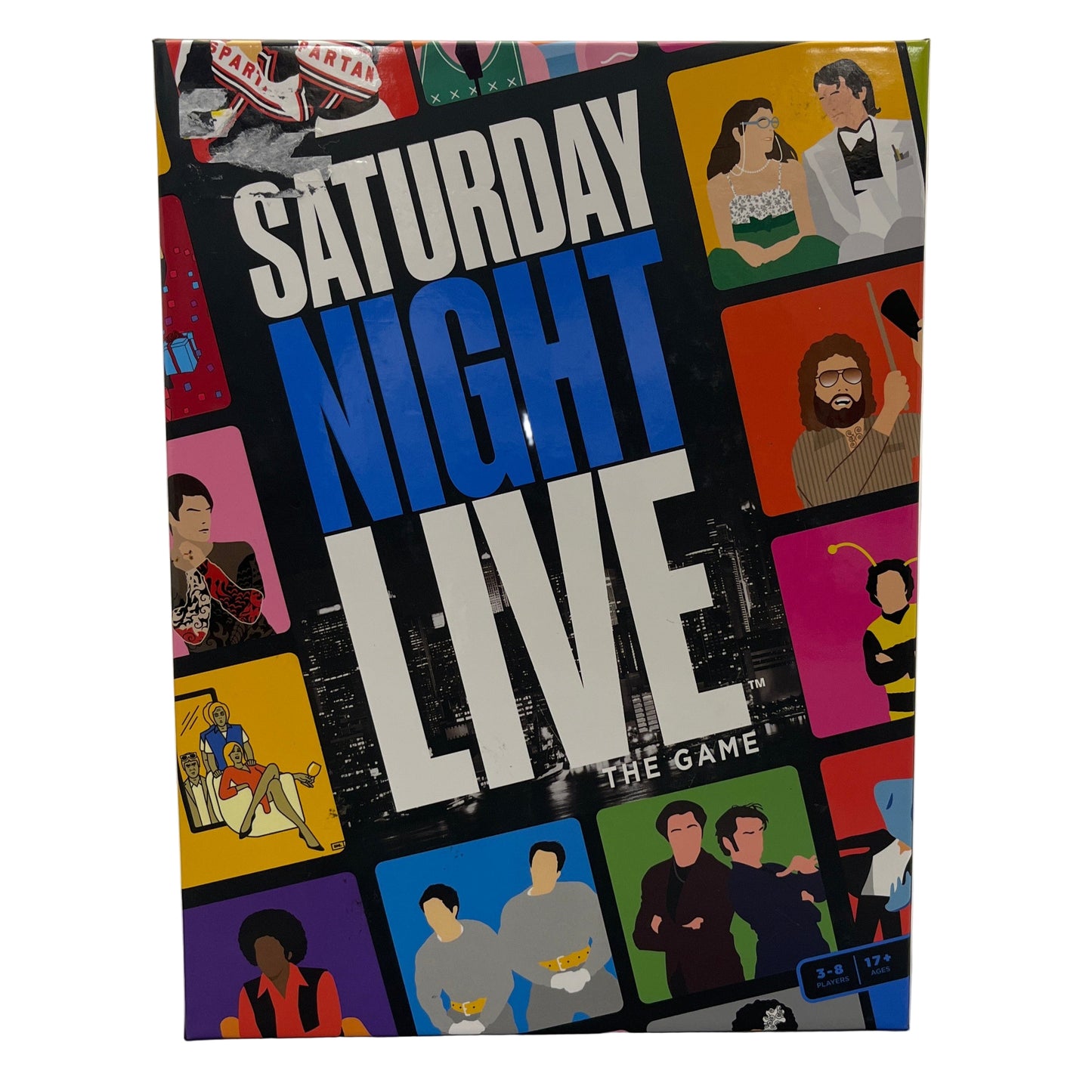 Board game box for 'Saturday Night Live' with colorful illustrations of characters and text.