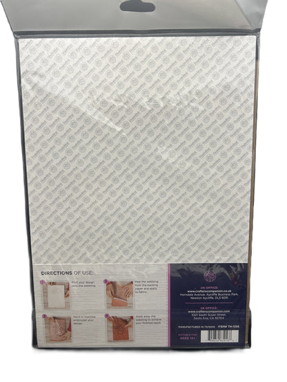 Back view of a mattress with brand label and care instructions on a white background