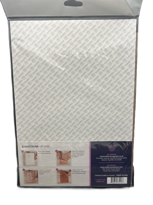 Back view of a mattress with brand label and care instructions on a white background