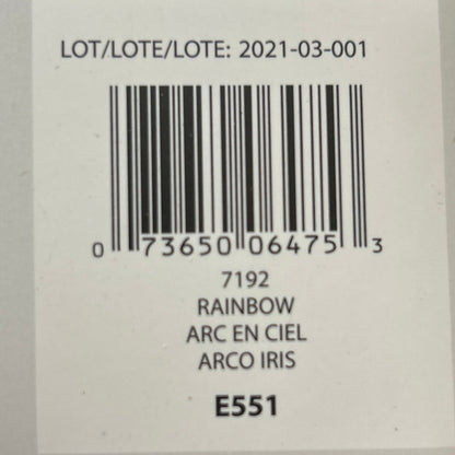Product label with barcode and text on a wooden surface