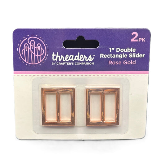 Packaging of 'threaders' rose gold double rectangle sliders on a white background