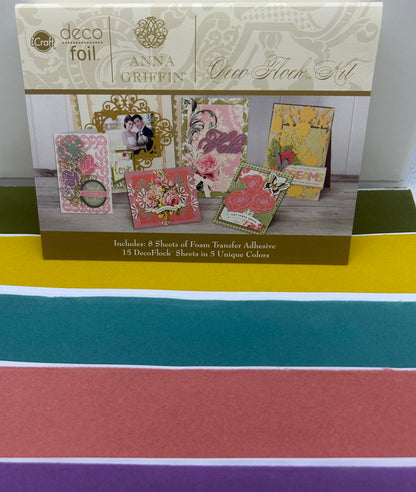 Box of Anna Griffin Deco Foil craft kit on a colorful striped background
