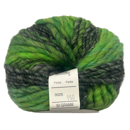 Green and gray skein of yarn with a label on a white background