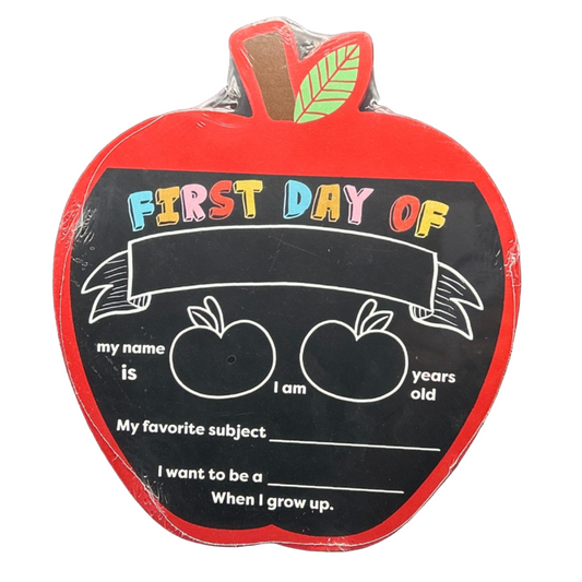 Apple-shaped sign for the first day of school with text fields on a black background
