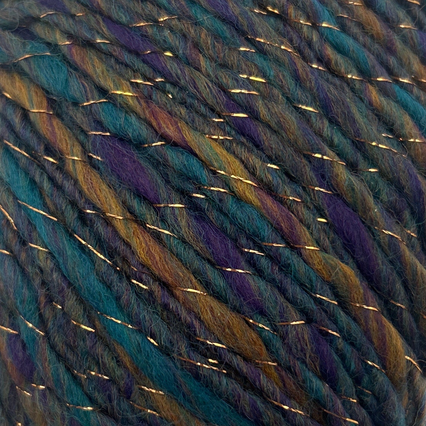 Multicolored yarn ball on a white background