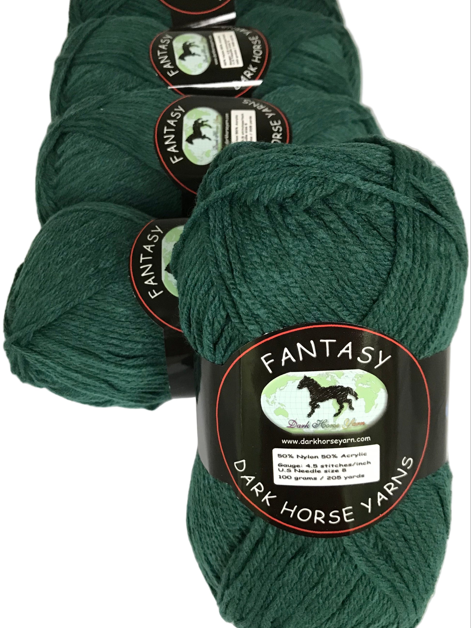 Dark green yarn skeins with 'Fantasy' label on a white background